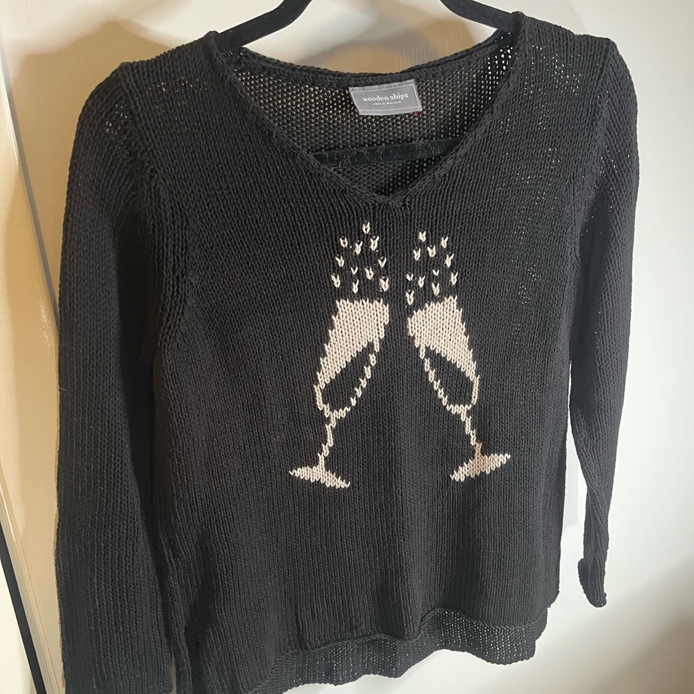Wooden Ships Black V-Neck Sweater with Champagne Glasses